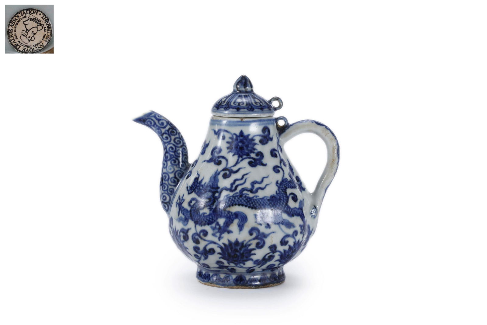 A Blue And White Dragon Melon-Form Ewer: A Blue And White Dragon Melon-Form Ewer 5 1/3 in. (13.5 cm.) high Provenance: Formerly in the collection of British Antique Dealer Association.