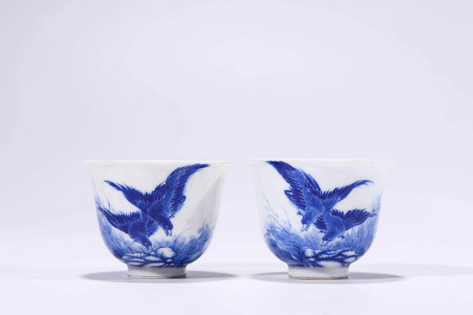 A Pair Of Blue And White Flower And Bird Cups: A Pair Of Blue And White Flower And Bird Cups Width: 2 11/16 in. (6.8 cm), Height: 1 15/16 in. (4.9 cm),