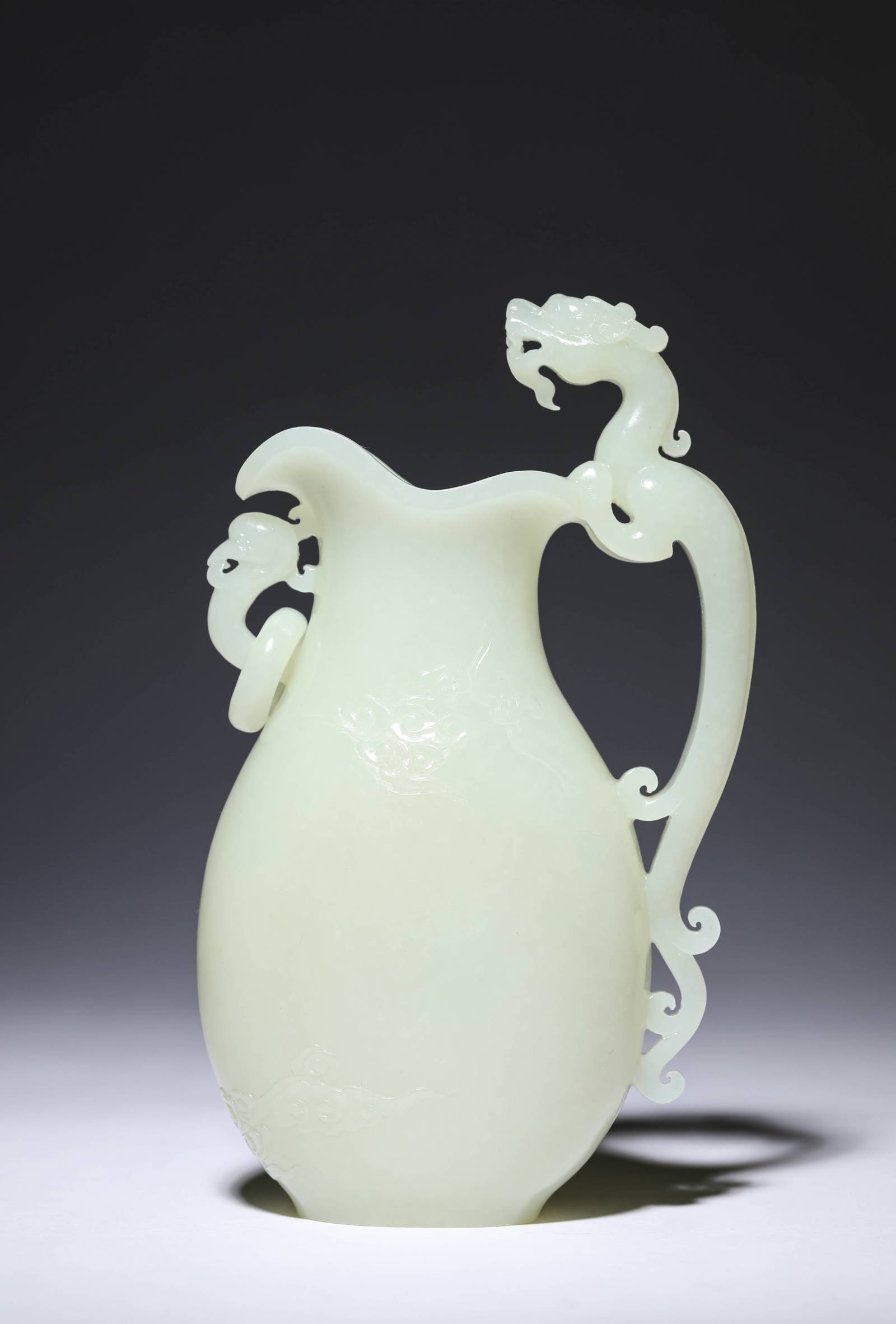 A Carved Jade Dragon Vase Auction