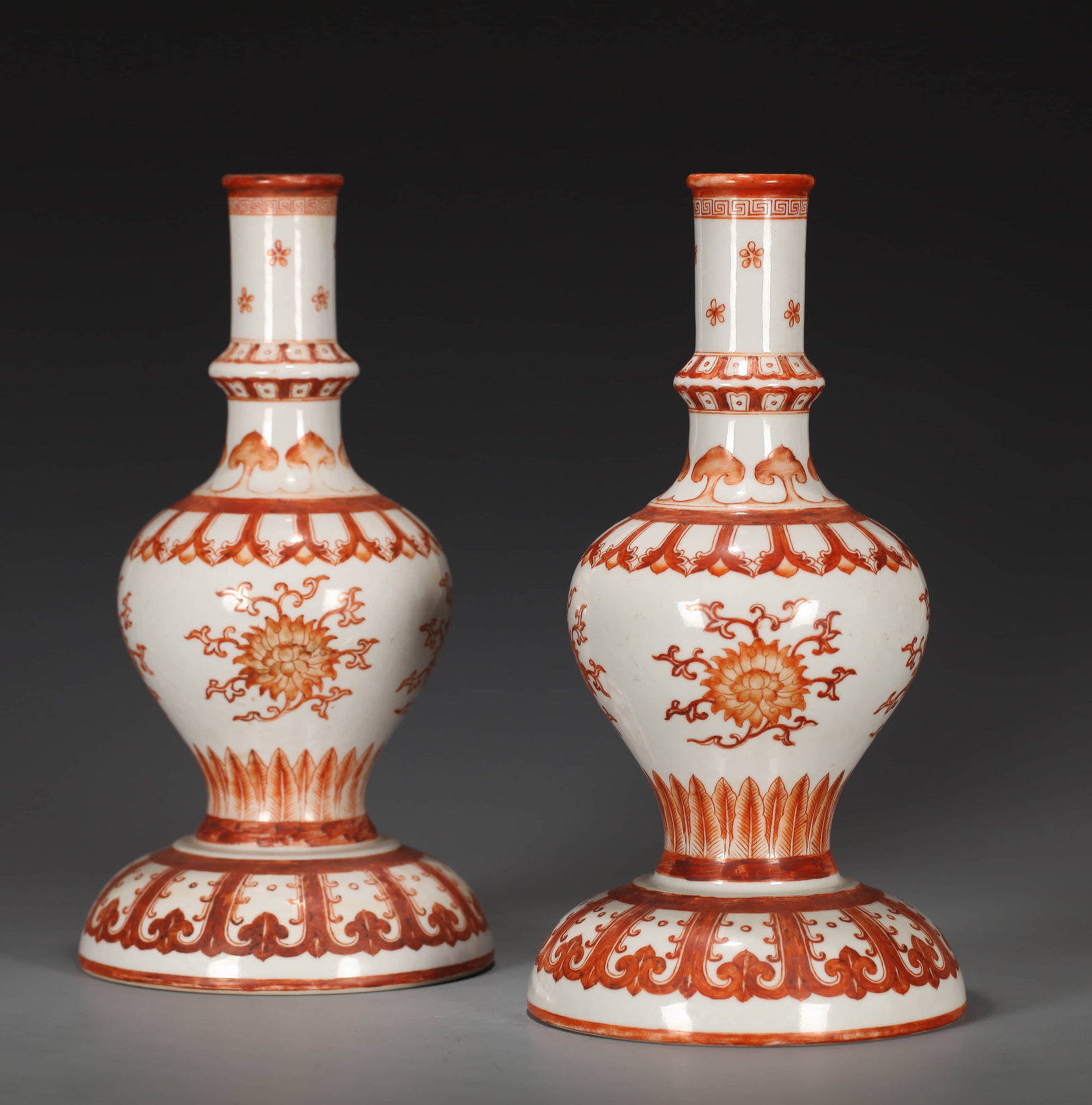 A PAIR OF IRON RED-DECORATED HOLY WATER FLASKS, CANGCAOPING: A PAIR OF IRON RED-DECORATED HOLY WATER FLASKS, CANGCAOPING Height: 22cm Condition: Any condition statement is given as a courtesy to a client, is only an opinion and should not be treated as a statem