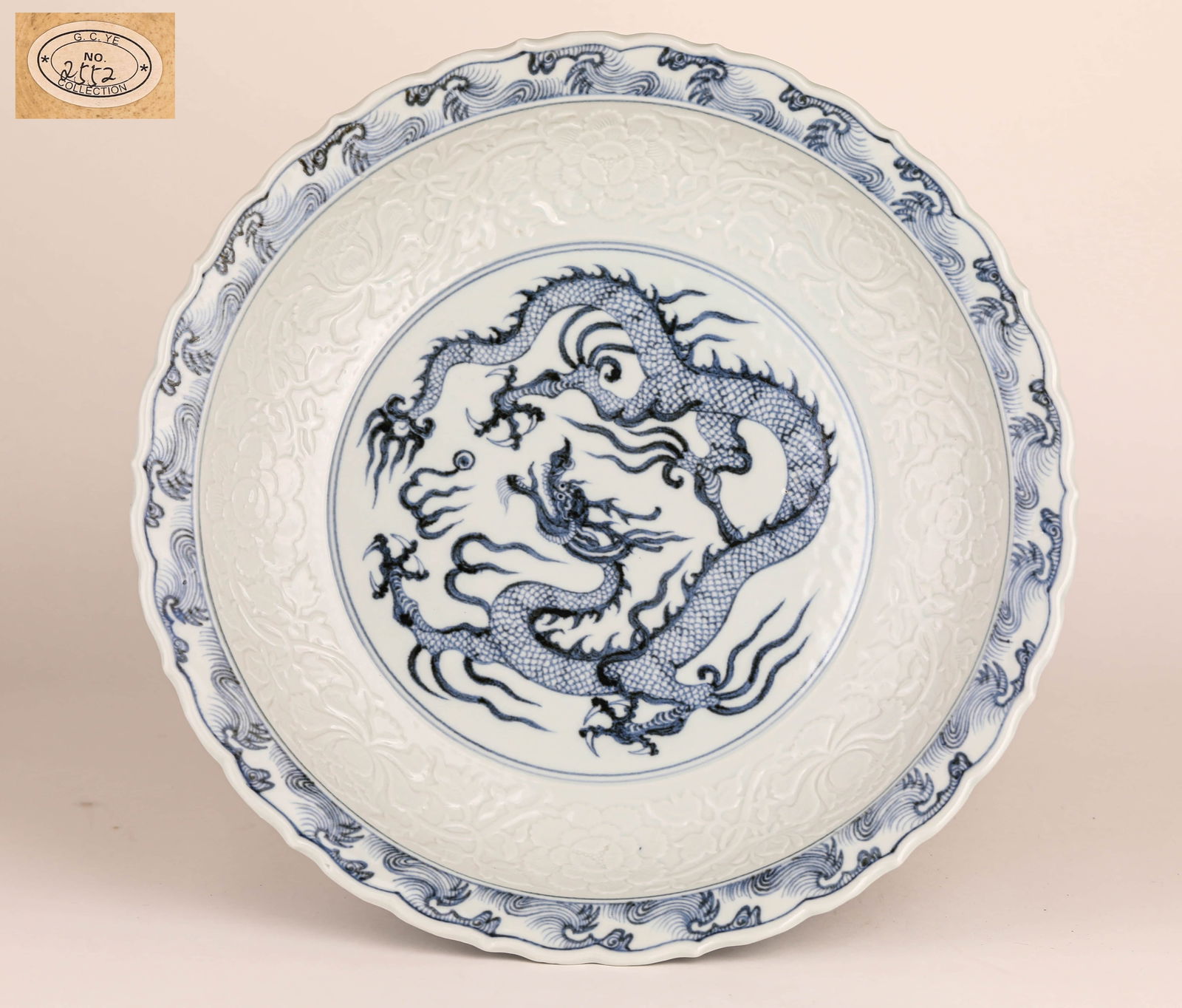 A LARGE BLUE AND WHITE DRAGON PLATE (1 of 7)