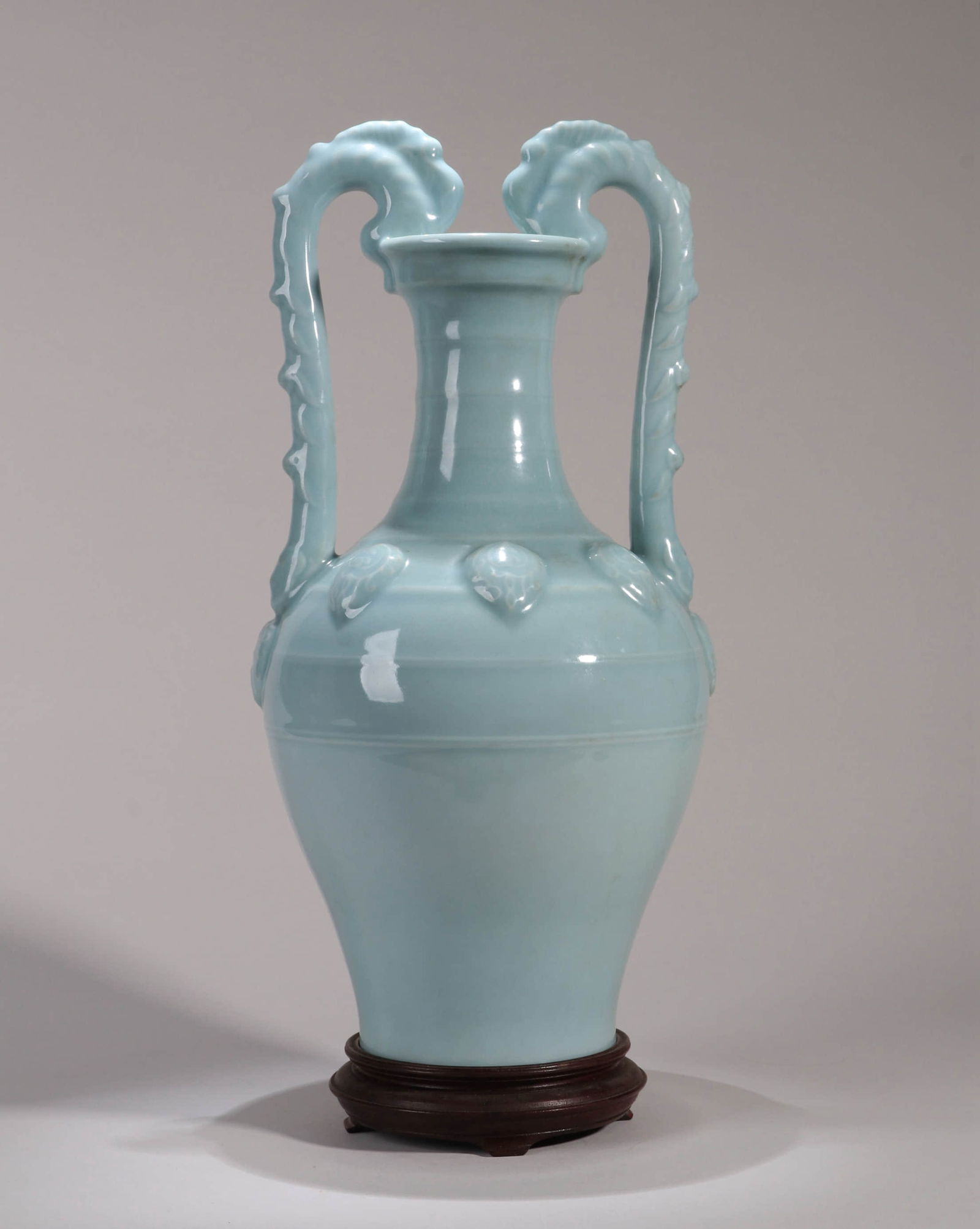 A LIGHT GREENISH-BLUE GLAZED DRAGON-HANDLED VASE (1 of 11)