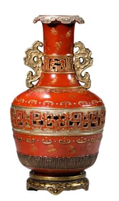 A CORAL RED GROUND GILT-DECORATED VASE