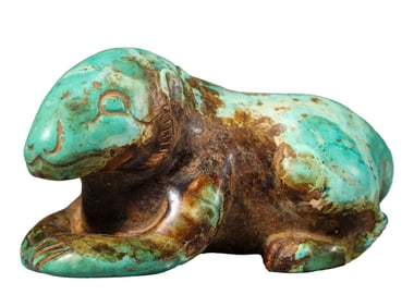 A CARVED TURQUOISE AUSPICIOUS BEAST