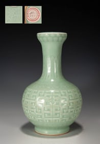 A CELADON-GROUND INCISED KUI DRAGON VASE