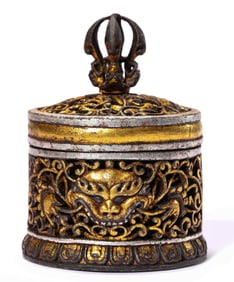 A TIBETAN IRON GILT RELIQUARY
