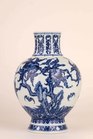 A BLUE AND WHITE POMEGRANATE- FORM VASE