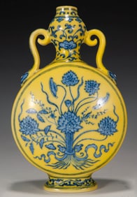 A YELLOW GROUND BLUE AND WHITE LOTUS RUYI EAR MOON FLASK