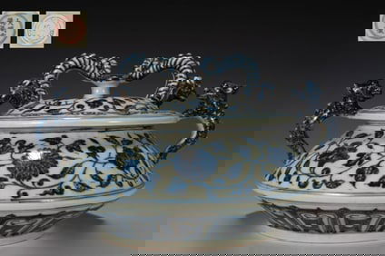 A BLUE AND WHITE ENTWINED FLOWER JAR AND COVER