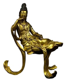 A GILT-BRONZE FIGURE OF SLEEPING BUDDHA