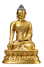 A GILT-BRONZE FIGURE OF SEATED SHAKYAMUNI