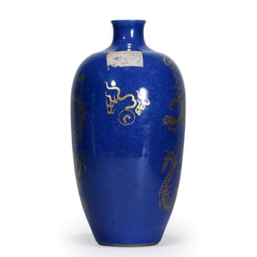 A BLUE GLAZE GOLD PAINTED VASE