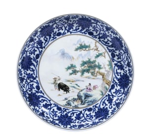 A GUAN-TYPE BLUE AND WHITE AND FAMILLE ROSE LANDSCAPE AND FIGURES PLATE