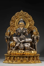 A SILVER-GILT FIGURE OF GREAT SAGE