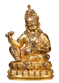 A GILT-BRONZE FIGURE OF SEATED WEALTH GOD