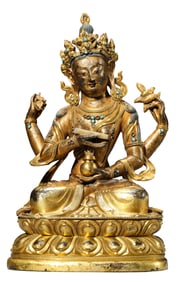 A GILT-BRONZE FIGURE OF SEATED BUDDHA