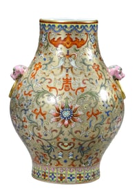 A FAMILLE ROSE GILT-DECORATED ENTWINED LOTUS LION EAR VASE