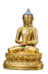 A GILT-BRONZE FIGURE OF SEATED MINA DEITY