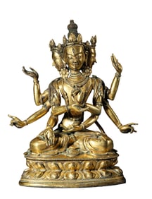 A GILT-BRONZE FIGURE OF SEATED EIGHT-ARMED GUANYIN