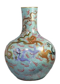 A FAMILLE ROSE NINE DRAGONS AND SEA WAVE BOTTLE VASE