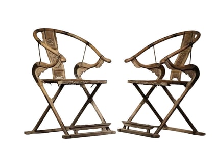 A PAIR OF FOLDING CHAIRS