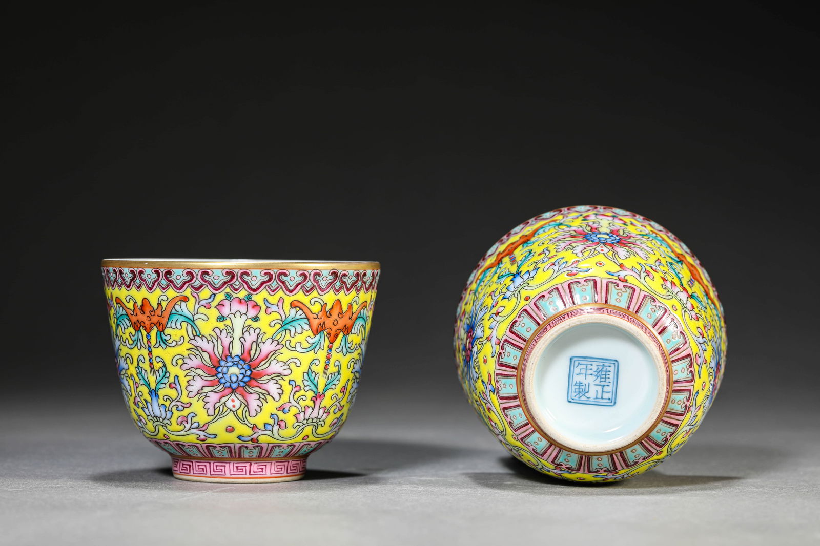 A PAIR OF LEMON YELLOW GROUND FAMILLE-ROSE CURSIVE LOTUS PATTERN CUP: A PAIR OF LEMON YELLOW GROUND FAMILLE-ROSE CURSIVE LOTUS PATTERN CUP Dimensions: Width 7.8 cm, Height 6.2 cm (3 1/16 × 2 7/16 in.). All measurements are approximate. Condition:Any condition statement