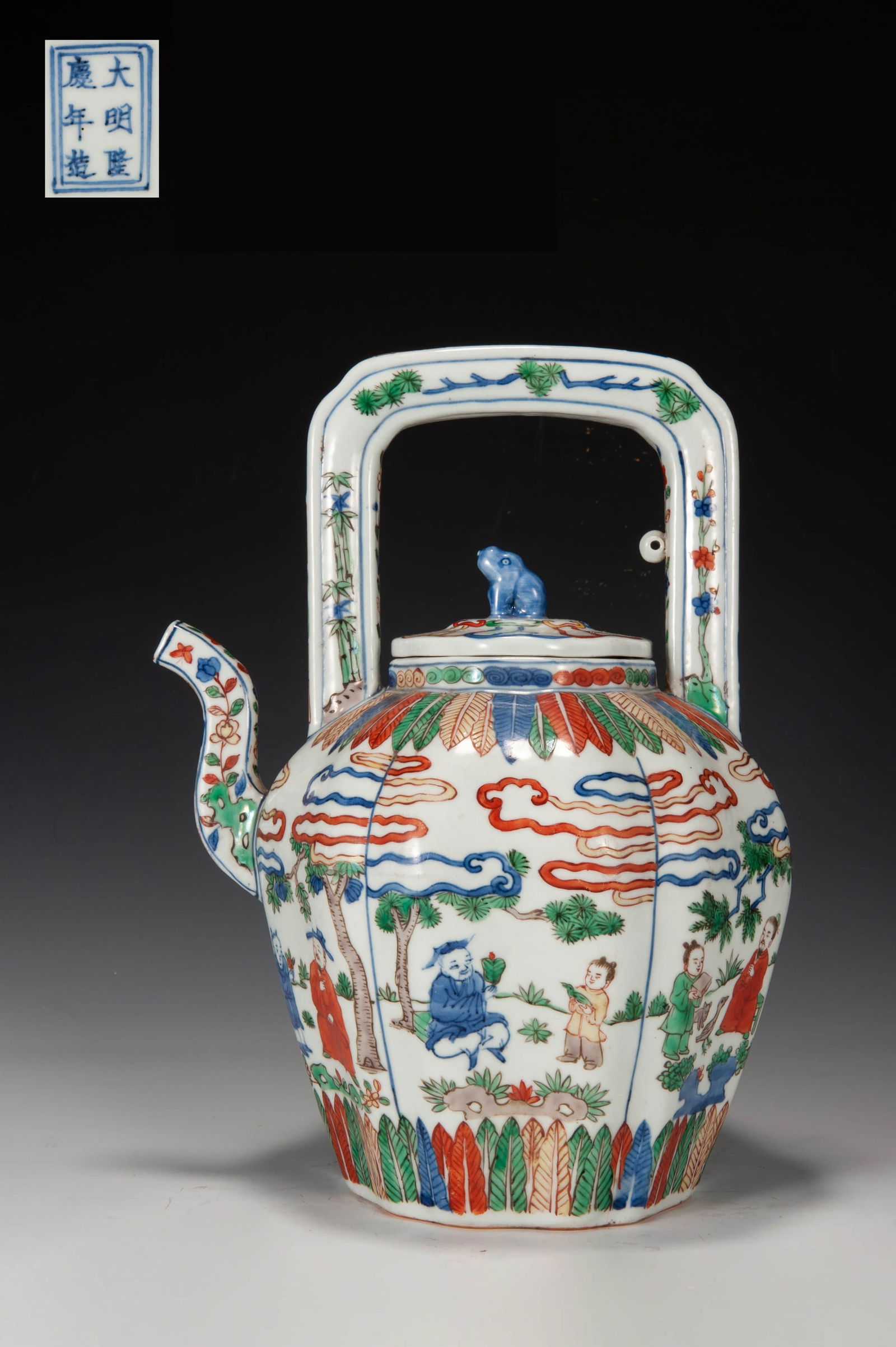 A BLUE AND WHITE WUCAI FIGURAL PATTERN HANDLE EWER (1 of 9)