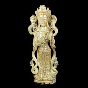 A JADE GUANYIN FIGURE