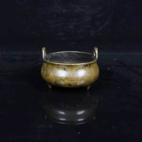 A BRONZE TRIPOD BURNER, XUANDELU