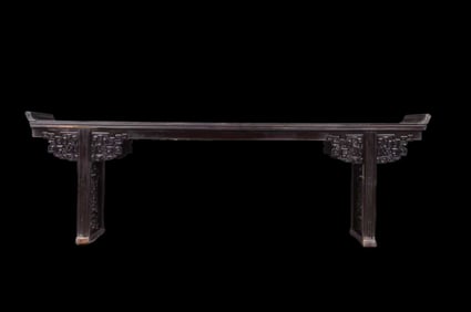 A SINGLE PLANK CARVED TABLE