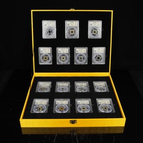 A SET OF ANCIENT COINS AND BOX