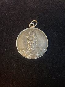 A 'YUAN SHIKAI' COMMEMORATIVE COIN