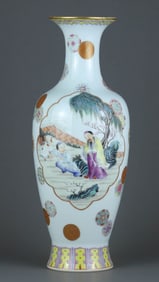 A FAMILLE ROSE MEDALLION 'FIGURES' VASE