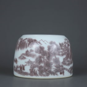 AN UNDERGLAZE RED 'LANDSCAPE WITH FIGURES' WATER POT