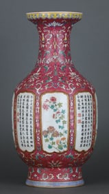 A RUBY RED-GROUND, FAMILLE ROSE MEDALLION 'FOUR SEASONS FLOWERS AND POETRY' VASE
