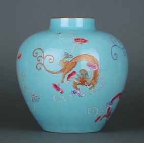 A GREEN-GROUND FAMILLE ROSE 'CHI DRAGON' JAR
