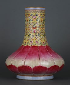A YELLOW-GROUND FAMILLE ROSE 'PASSION FLOWER AND PETAL' WATER CHESTNUT SHAPED VASE
