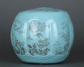 A GREEN-GROUND GRISAILLE 'LANDSCAPE AND FLOWERS' DRUM STOOL