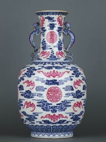 A BLUE AND WHITE RUBY RED 'CLOUDS AND SHOU' VASE