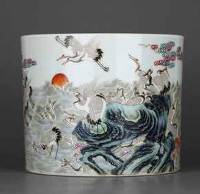 A FAMILLE ROSE 'CRANES ABOVE SEA HOUSE' BRUSH POT