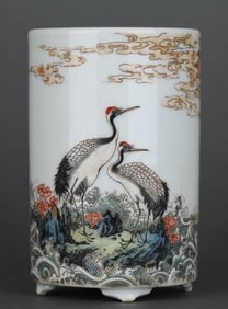 A FAMILLE ROSE 'SEA WATER AND CRANE' BRUSH POT
