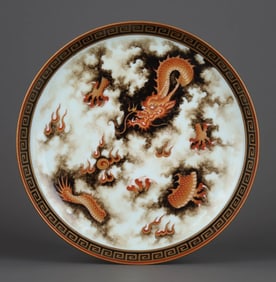 A GRISAILLE AND IRON-RED GILT DECORATED'DRAGON' DISH
