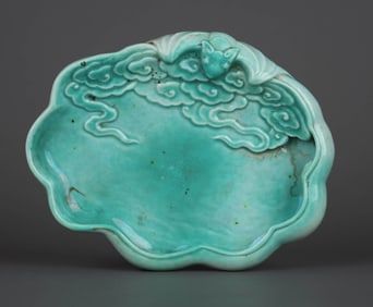 A GREEN GLAZED CARVED 'BAT' BRUSH WASHER