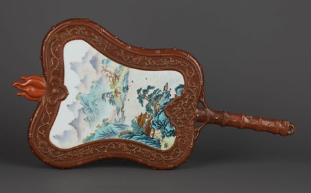 A RED-GLAZED CARVED AND GILT DECORATED' FLORAL' FAN