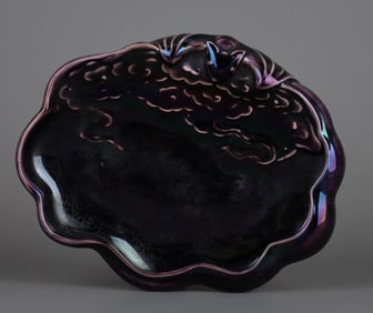 A PURPLE-GLAZED CARVED 'BAT' BRUSH WASHER