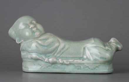 A SONG TYPE GREEN PORCELAIN DOLL PILLOW