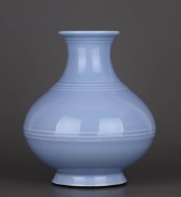 A BLUE GLAZED VASE