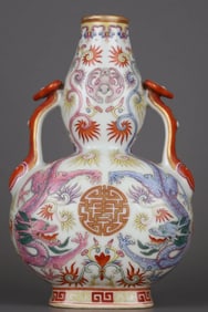 A FAMILLE ROSE 'TWIN DRAGONS' GOURD SHAPED VASE