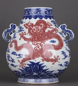 A BLUE AND IRON-RED 'DRAGON AND CLOUD' JAR