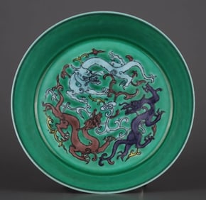 A GREEN-GLAZED AND SANCAI 'DRAGON' DISH